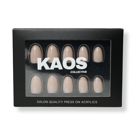 Box of press-on acrylic nails by KAOS Collective on a white background