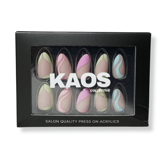 Box of press-on acrylic nails with colorful designs and 'KAOS Collective' branding.