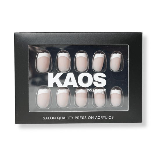 Box of press-on acrylic nails with 'KAOS' branding on a white background