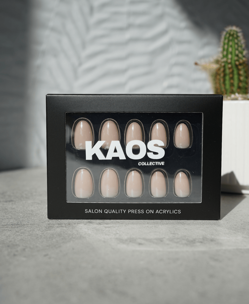 Box of KAOS Collective press-on acrylic nails on a neutral background
