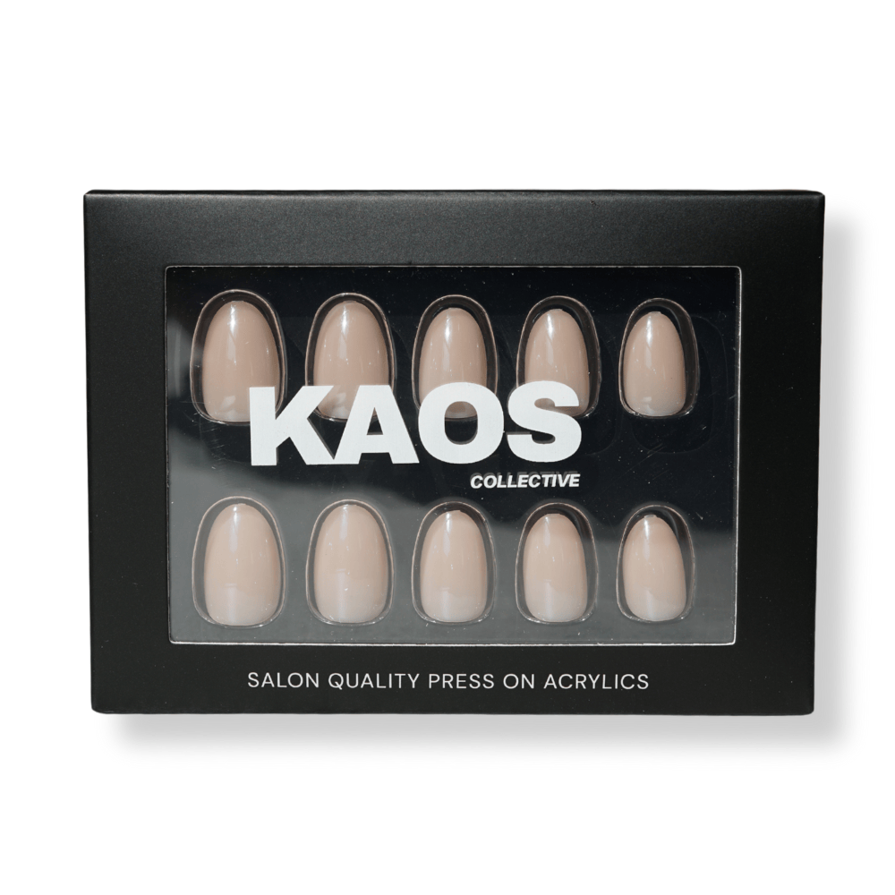 Box of press-on acrylic nails by KAOS Collective on a white background