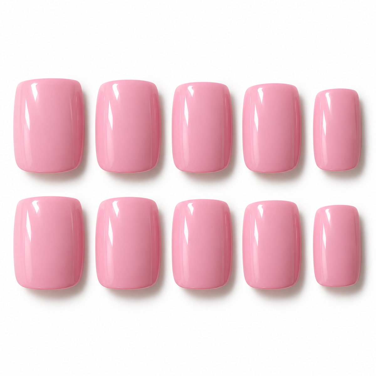 Ten pink press-on nails arranged in two rows of five on a plain white background.