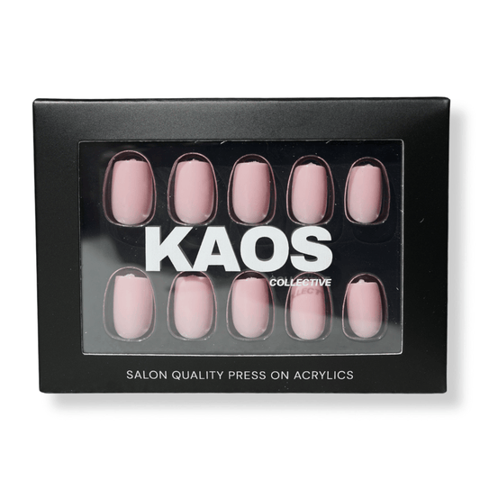 Box of pink press-on nails with 'KAOS Collective' branding on a white background